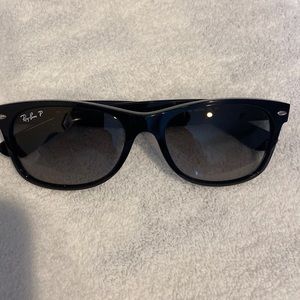 Ray Ban New Wayfarer- black - like new, polarized. Lenses in perfect condition.